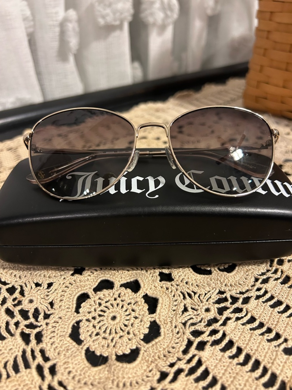 Juicy Couture gold sunglasses are model JU 620/G/S
